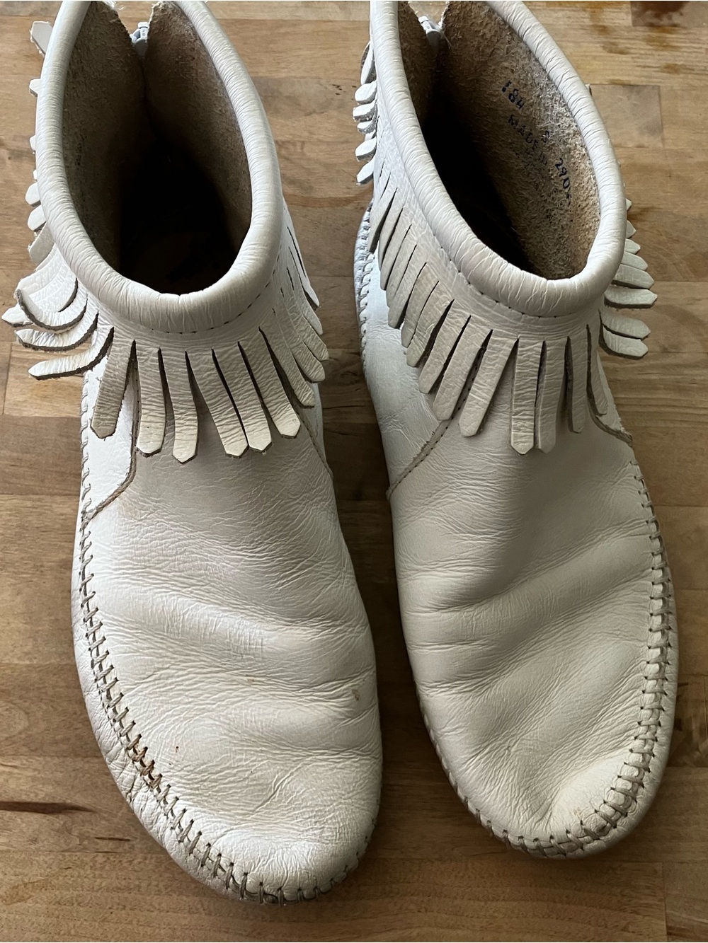 Minnetonka White Leather Fringe Ankle Boots